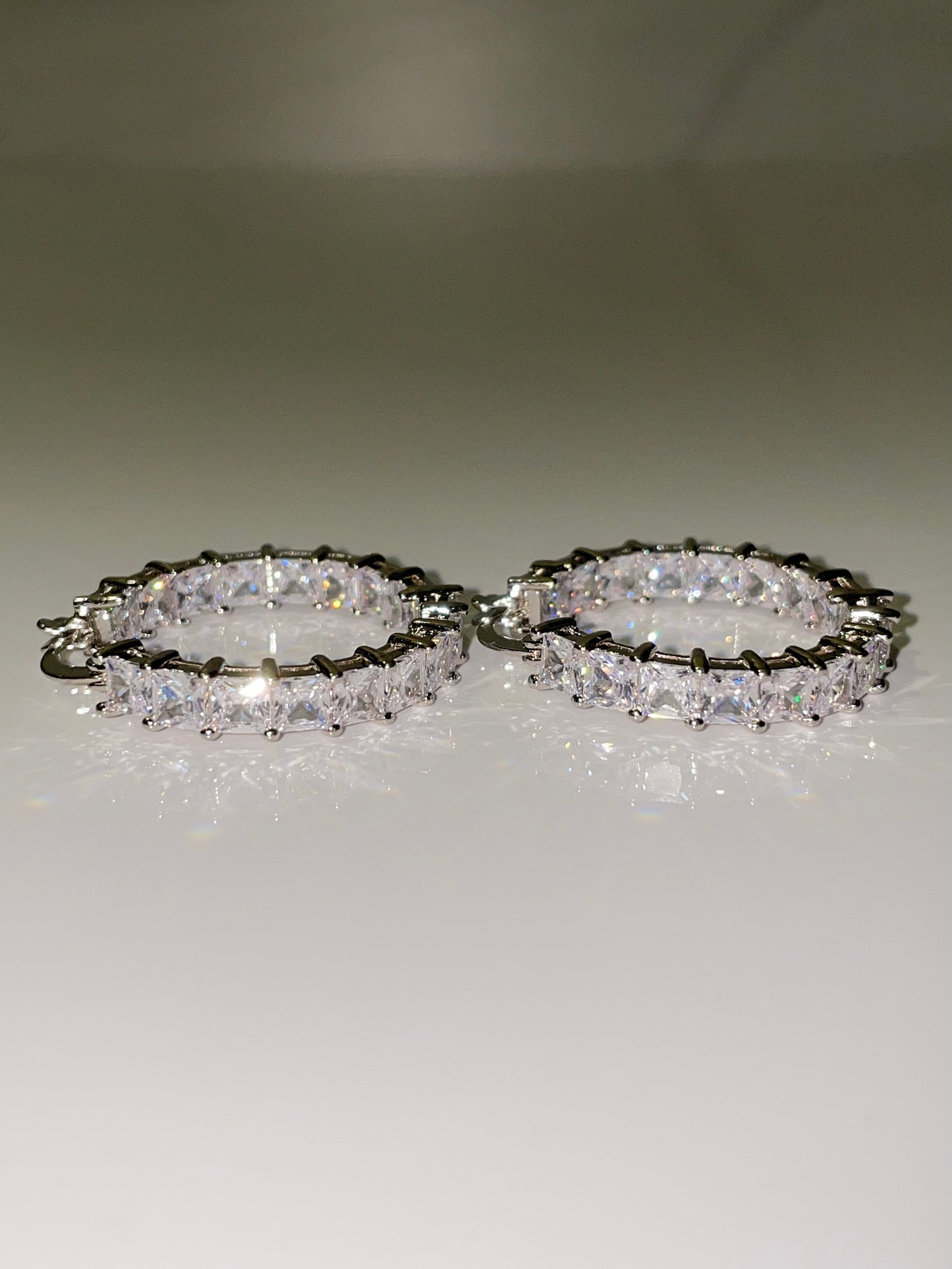 cubic zirconia inside out mini hoop earrings