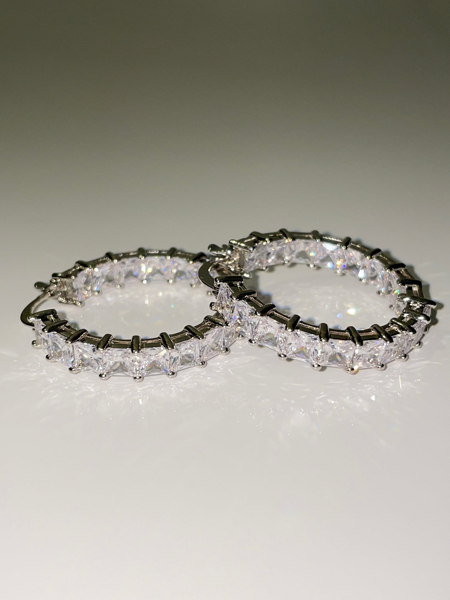 cubic zirconia inside out mini hoop earrings