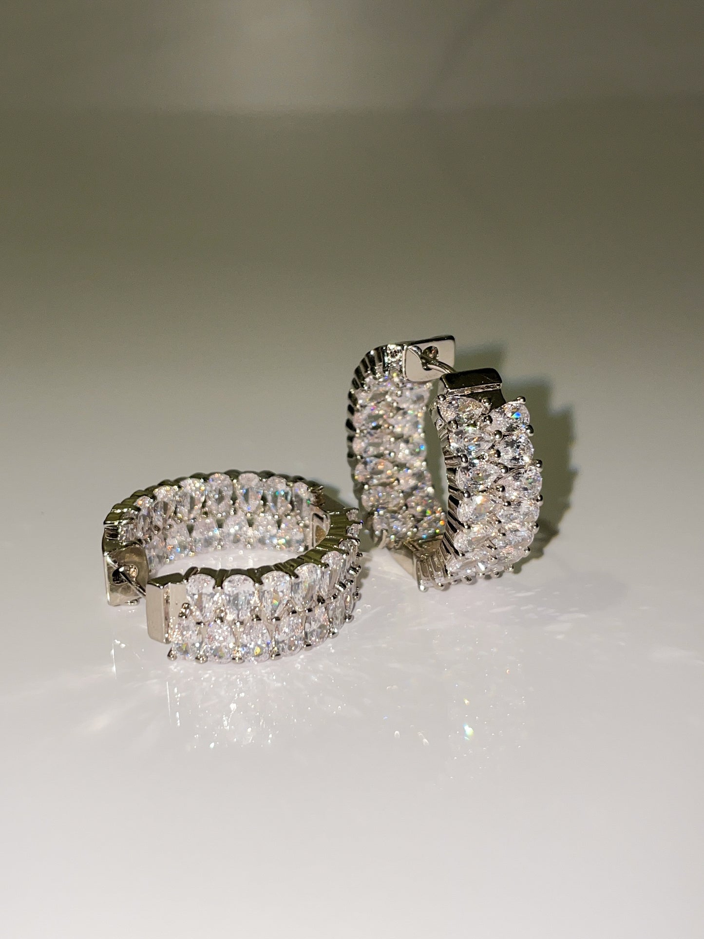 silver cubic zirconia inside out mini hoop earrings