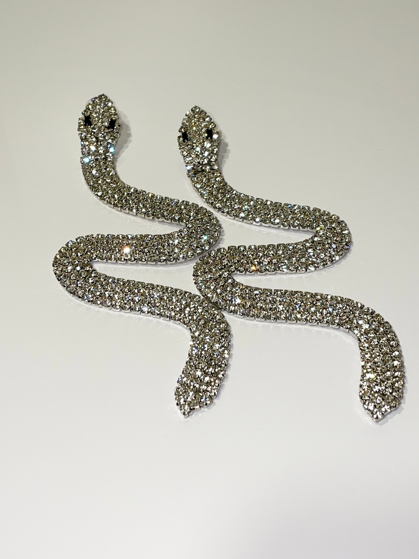 silver rhinestone bling snake earrings 