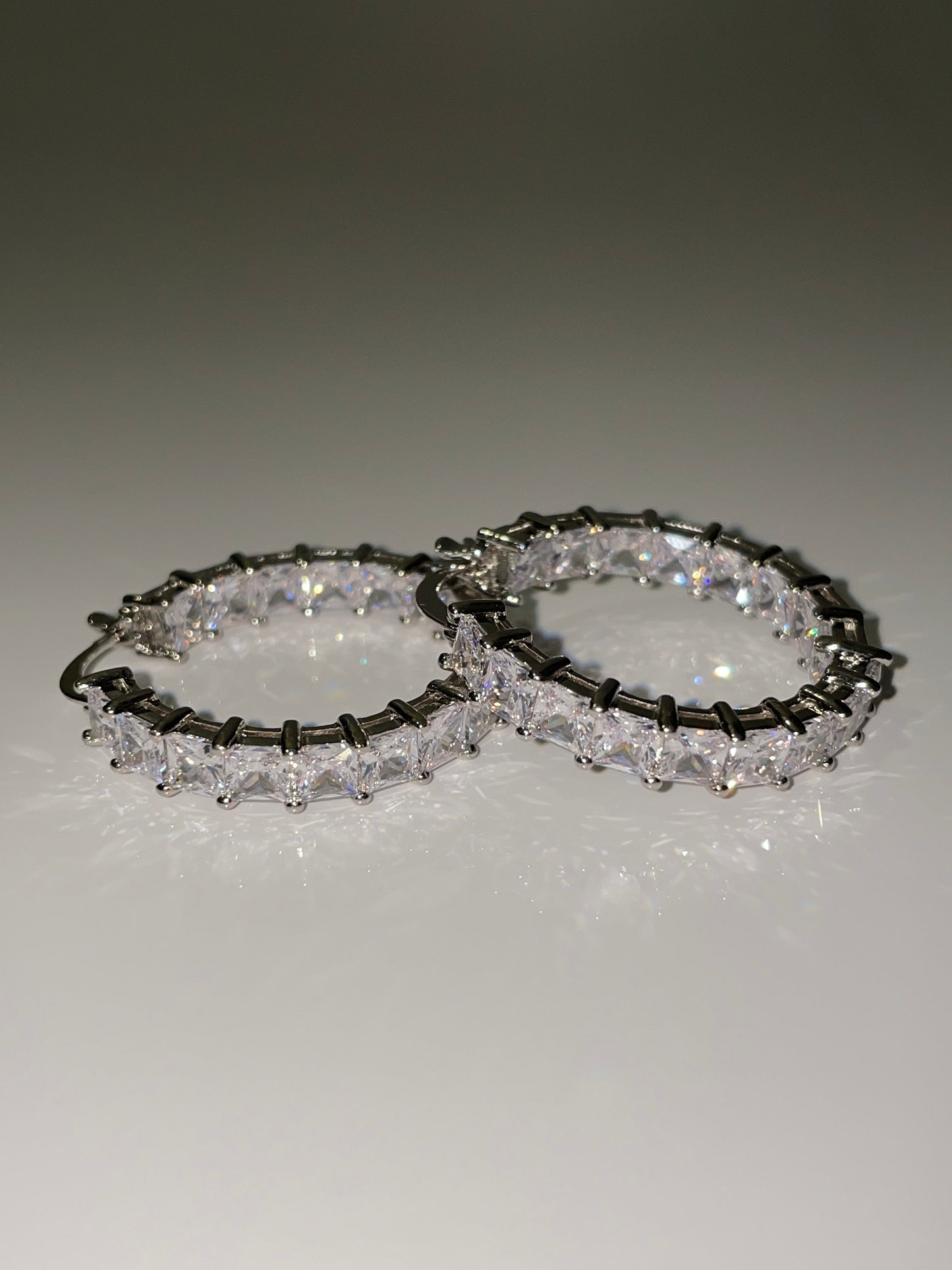 cubic zirconia inside out mini hoop earrings