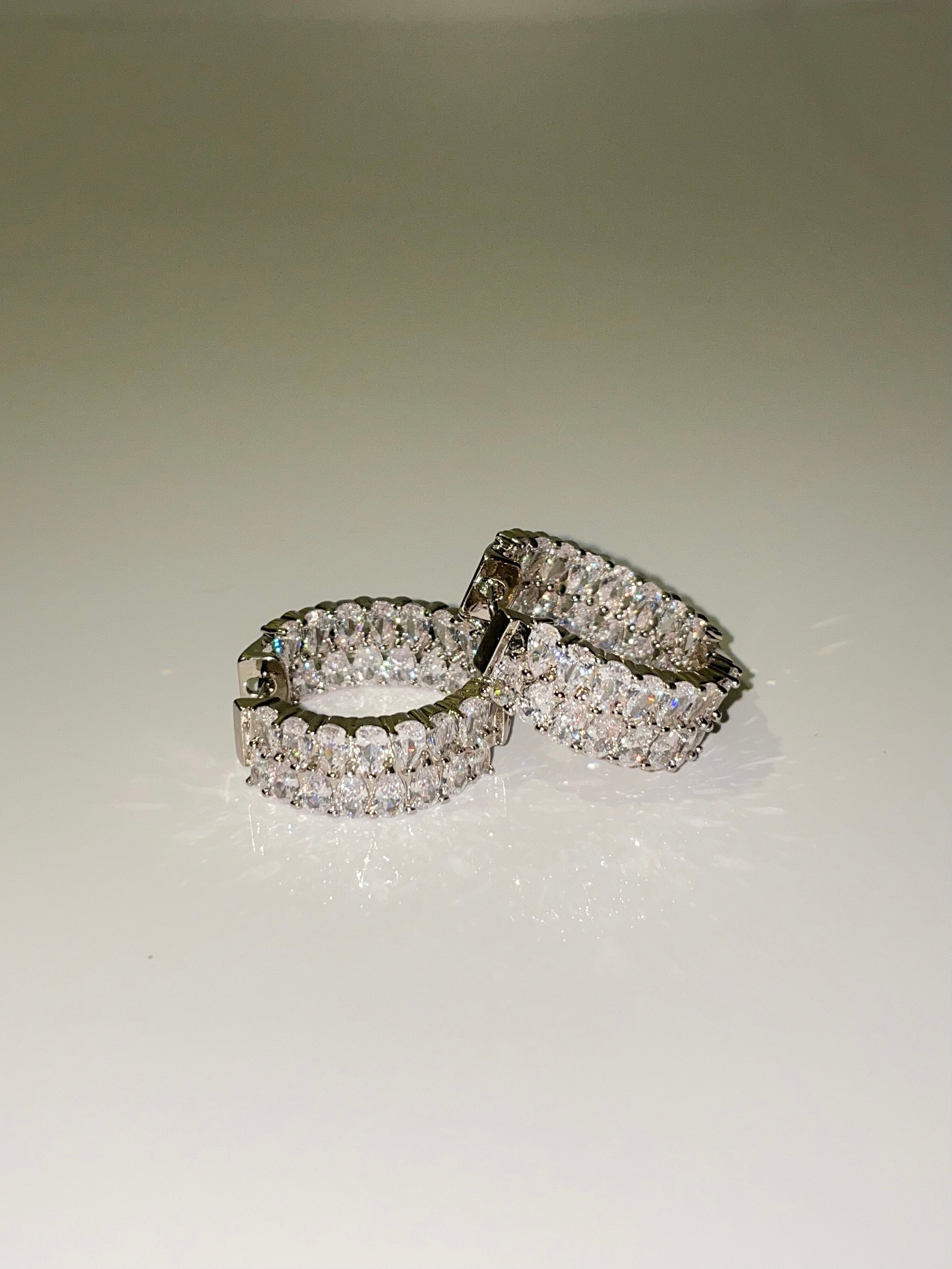 silver cubic zirconia inside out mini hoop earrings