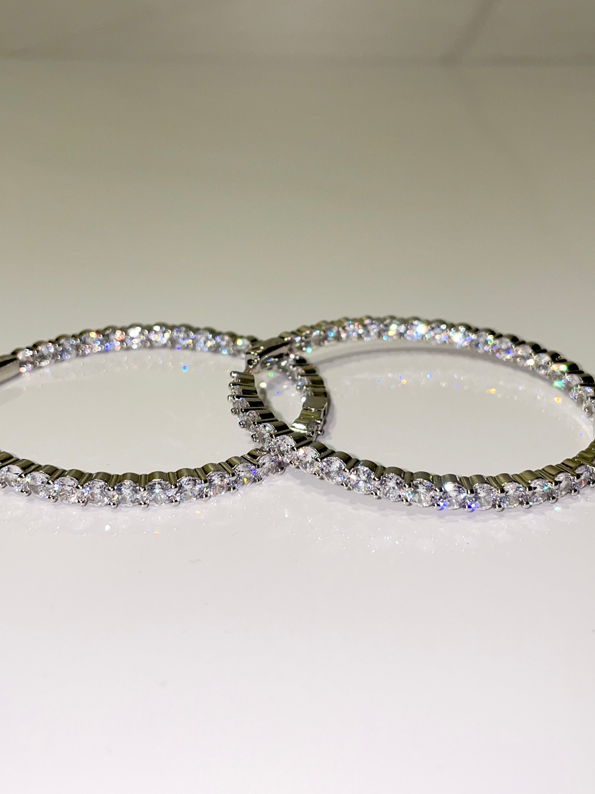 silver bling cubic zirconia cz inside out hoop earrings