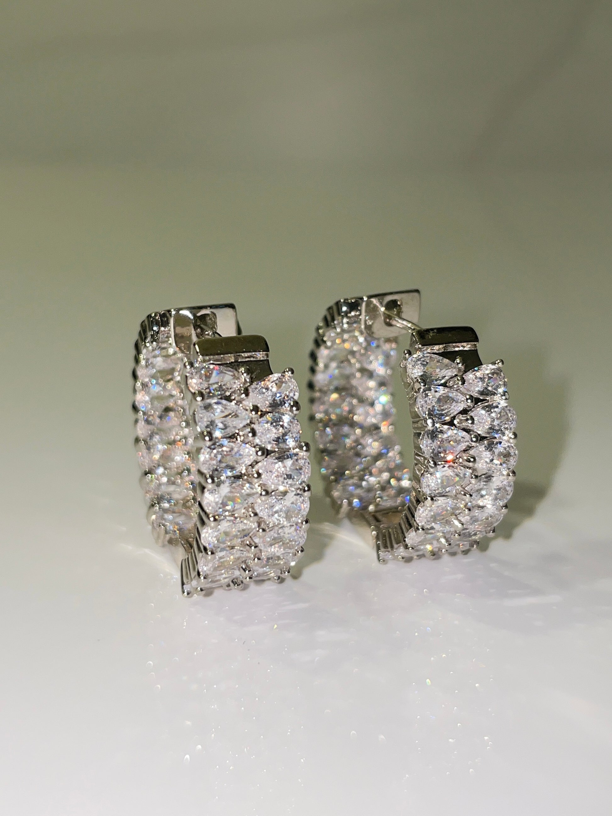 silver cubic zirconia inside out mini hoop earrings