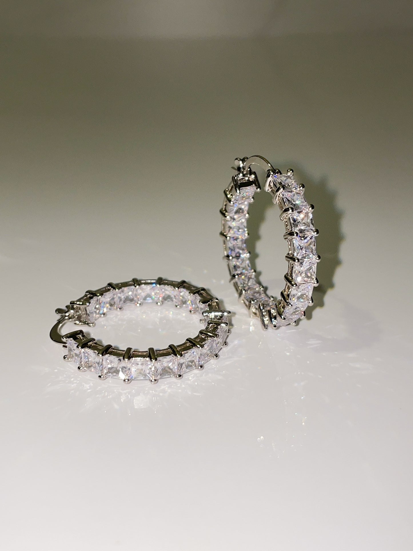 cubic zirconia inside out mini hoop earrings