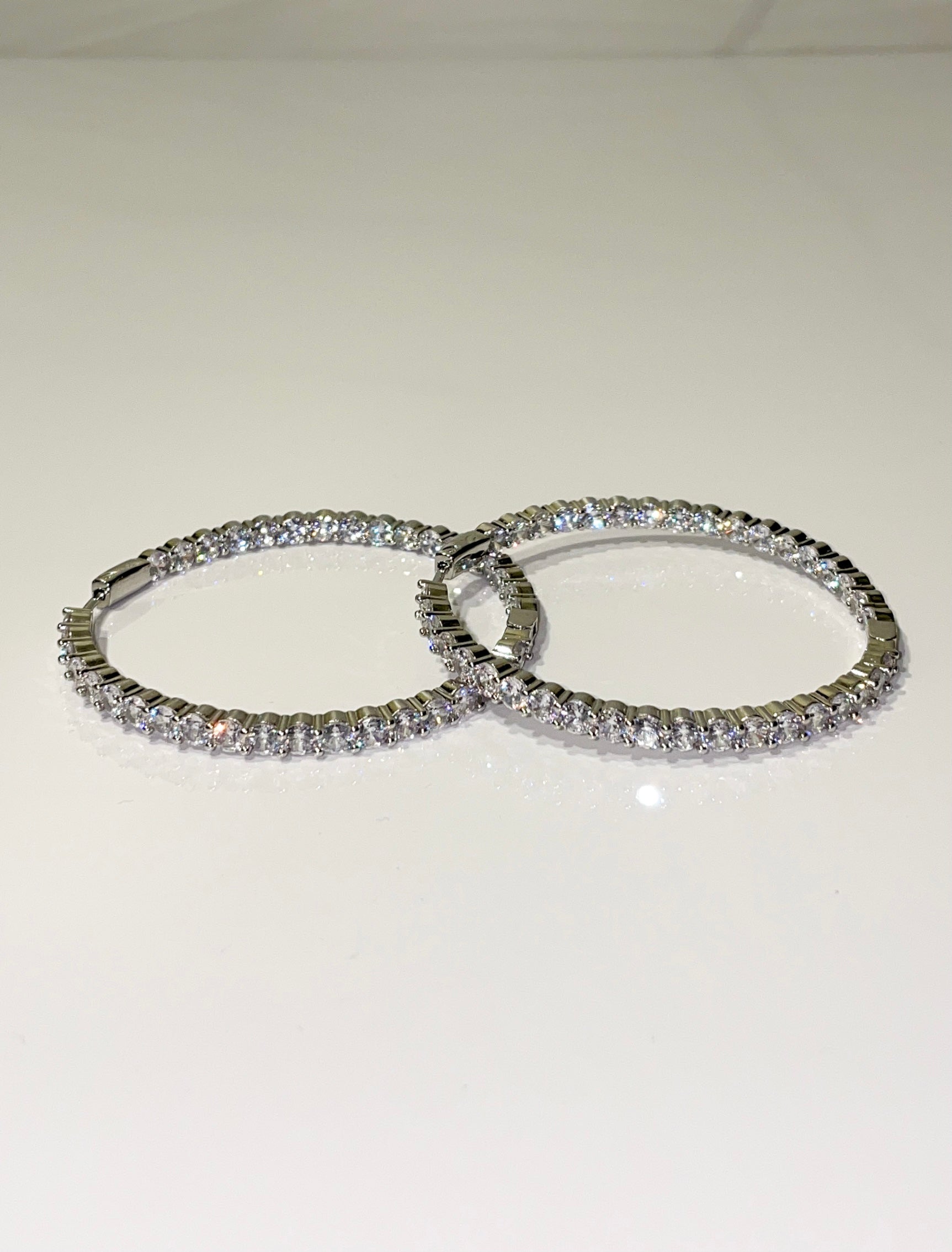 silver bling cubic zirconia cz inside out hoop earrings